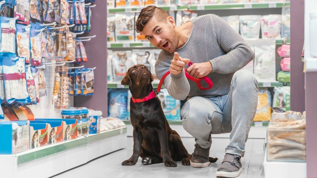 adorable dog with owner pet shop